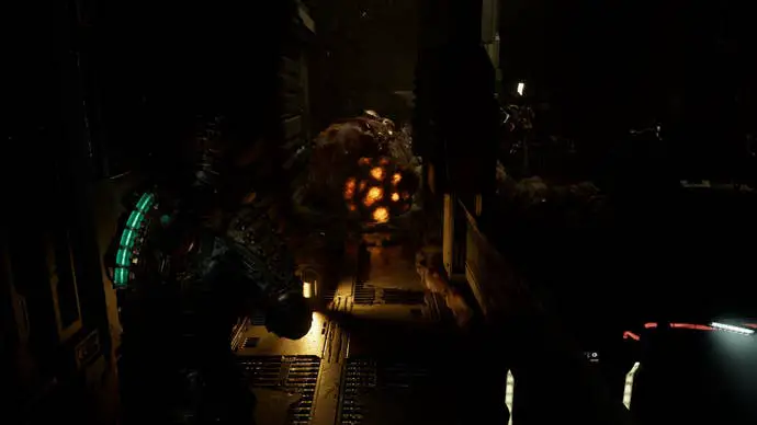 Isaac apunta a bombillas cáusticas en Dead Space