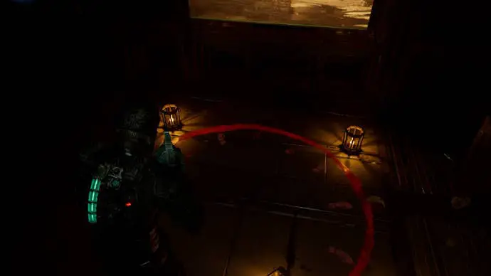 Isaac mira el círculo ritual en el salón Dead Space