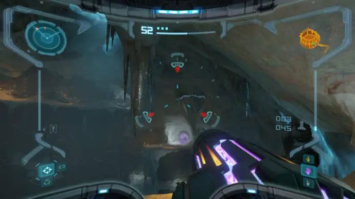 Samus apuntando a una estalactita junto a una puerta en Metroid Prime Remastered