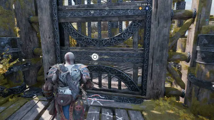Kratos abre una puerta de metal gigante en God of War Ragnarok