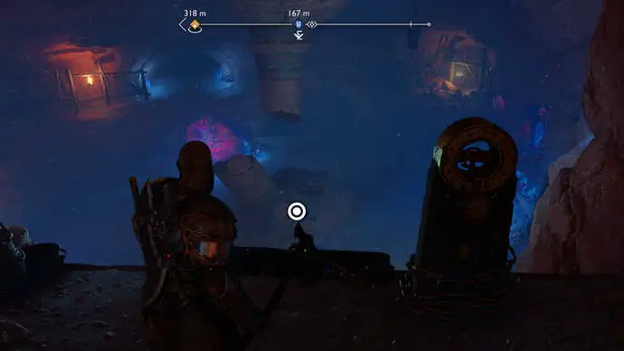 Kratos se desliza por una cadena para llegar al suelo de la cueva en God of War Ragnarok