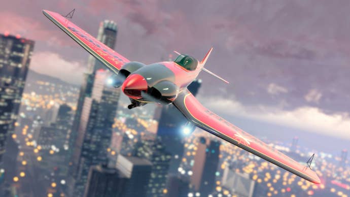 Un Buckingham Alpha-Z1 rojo sobrevolando Los Santos en GTA Online.